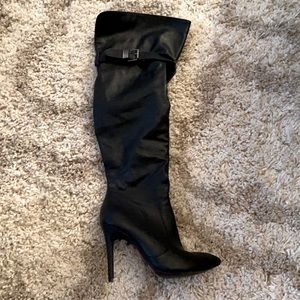 Black heeled boots, over the knee